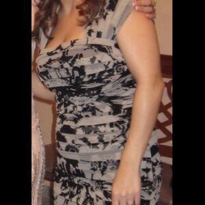 Black and cream fitted cocktail dress